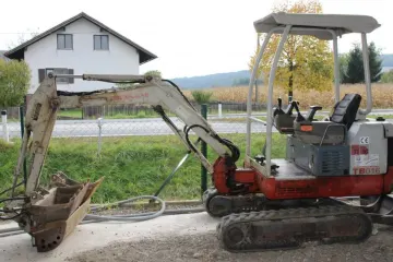 Minibagger mit Schutzdach zum Ausleihen